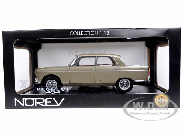   car of 1965 Peugeot 404 Gold die cast model car by Norev. Item