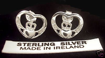 These earrings are solid sterling silver and are stamped .925. Each 