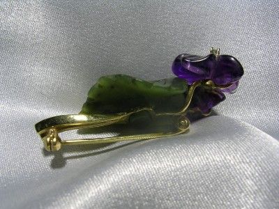   hand made unique carved gemstone brooch in excellent condition