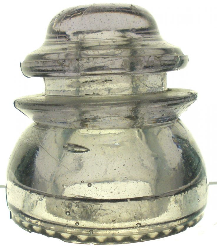 VERY CRUDE LIGHT LAVENDAR CD 154 GLASS INSULATOR.  