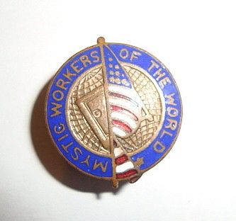   WORLD PIN. ON THE BACK MANFD. BY J.M. GOODELL JR. AUSTIN, ILL